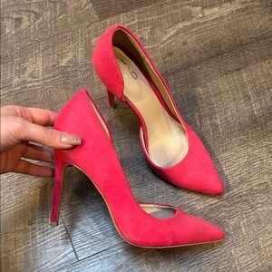Hot pink suede pumps